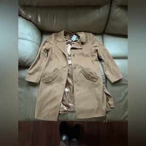 Brand new Dennis winter coat.